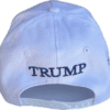 A white hat with the word " trump " on it.