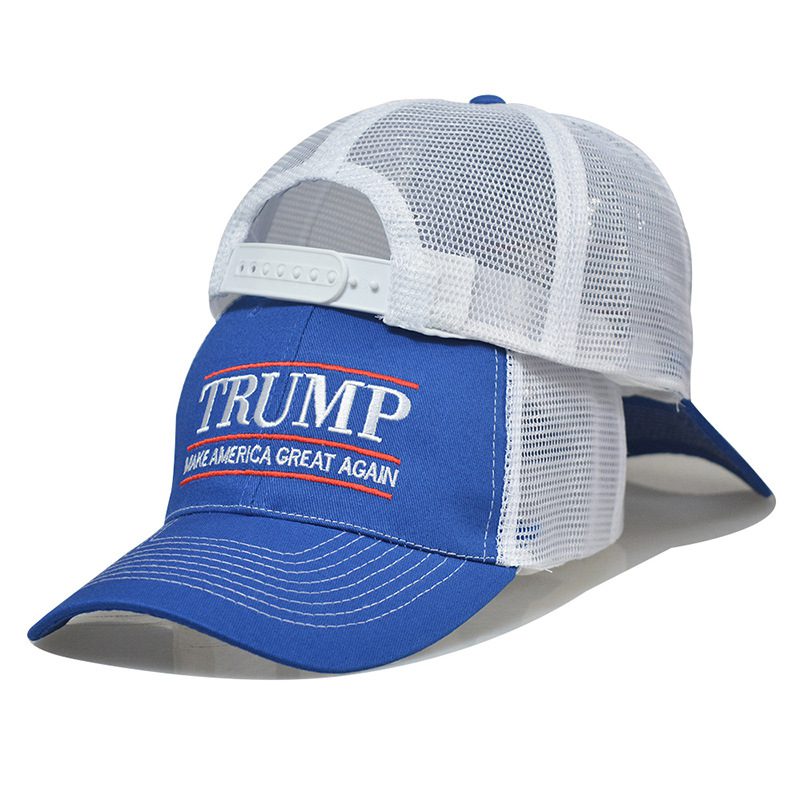 A blue and white hat with the words " trump " on it.